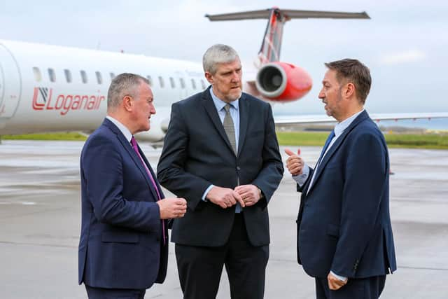 Economy Minister Conor Murphy and Infrastructure Minister  John O’Dowd with  Steve Frazer, Managing Director, City of Derry Airport, at the announcement of funding to protect the continuation of flights from the airport to London Heathrow. Credit Lorcan Doherty