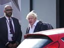 Former Prime Minister Boris Johnson arrives at Gatwick Airport in London, after travelling on a flight from the Caribbean, following the resignation of Liz Truss as Prime Minister. Picture date: Saturday October 22, 2022.