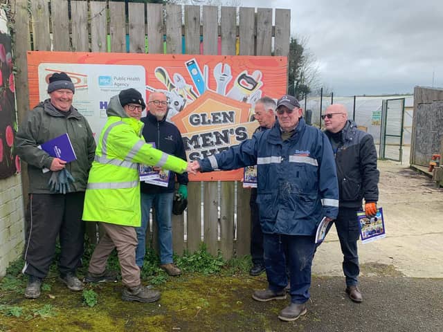 Glen Men's Shed members with the new resource.