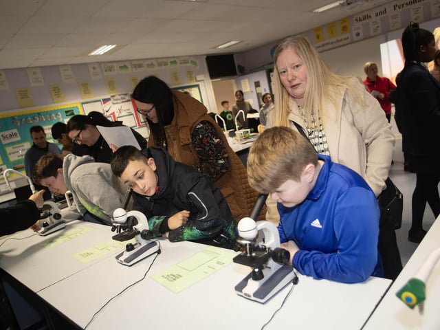 Pupils and parents enjoying the 'science experience' at Oakgrove Integrated College's Open Day.