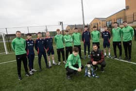 Derry City manager Tiernan Lynch pictured with players and coaches from the successful St. Joseph's Boys School u-18 Northern Ireland Schools Cup during a visit to the school on Tuesday morning. (Photos: Jim McCafferty Photography)