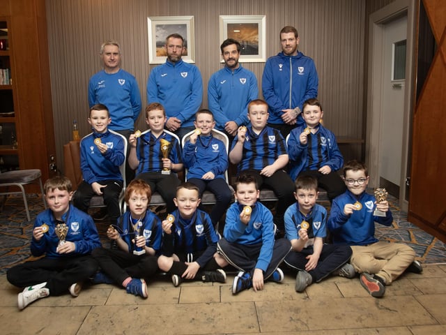 The 2015s Oxford United squad pictured with coaches James McGarrigle, Anthony Doherty, Ryan Gallagher and Marty Beattie at the awards ceremony in the Maldron Hotel, Derry.