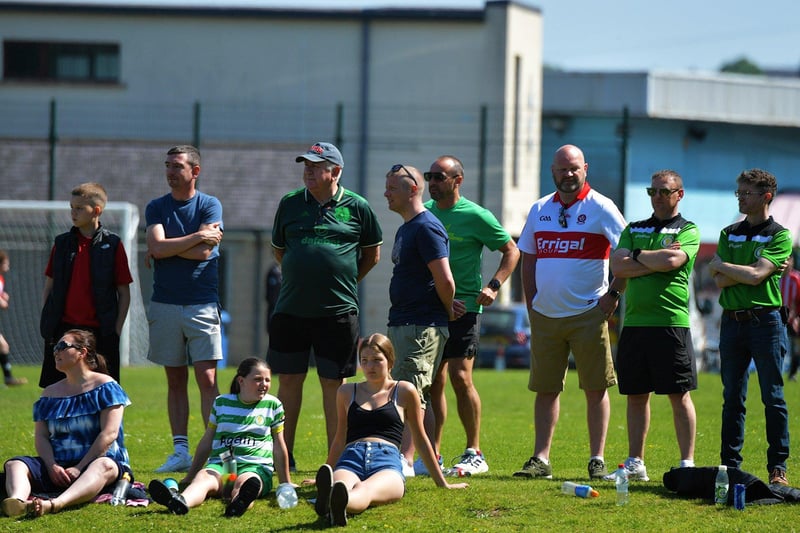 Spectators enjoy the sunshine and soccer at the D&D Championship Summer Cup finals at Prehen on Sunday morning last. Photo: George Sweeney. DER2322GS - 49