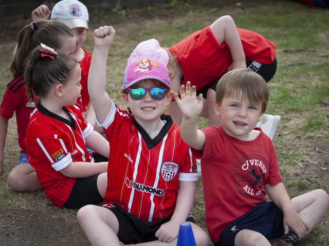 A wave to the camera from these young participants at the Greenhaw PS Sports Day.