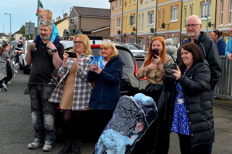Spectators at the Bealtaine Parade in Creggan on Wednesday evening. Photo: George Sweeney. DER2318GS – 66