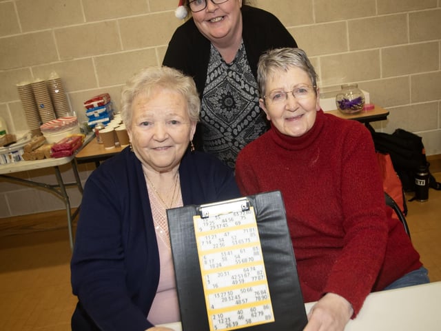 All ready for the Old Library Trust's Christmas Bingo on Wednesday night are Margaret McDaid, Isobel Taylor and Margaret Taylor. (Photos: Jim McCafferty Photography) : .