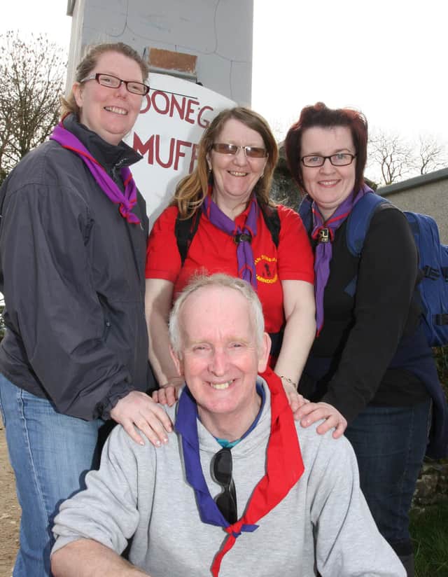 2011: Scouts leaders from the 8th Donegal (Carndonagh) Mary Hirrell, Pauline Loftus and Anne-Marie Monagle (Andy), pictured with Dessie Taylor, St. Eugene's 4th Derry during an Errigal Scout Challenge in Lenamore. 2604JM34