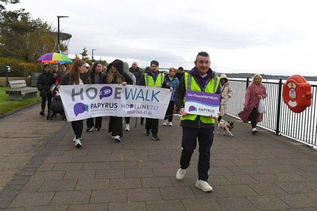 People taking part in the Foyle Hopewalk for PAPYRUS (Prevention of Young Suicide) charity, along the Foyle Embankment, on Tuesday evening last. Photo: George Sweeney