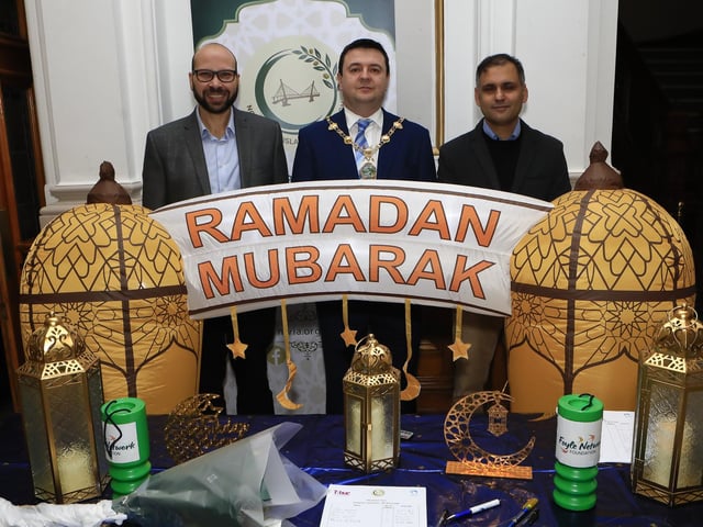 Mayor Ruairí McHugh with on left, Dr. Sameh Sayed Ali Hasson and on right Dr. Raumeen Gani at the “Taste of Ramadan” held in St. Columb’s Hall on Sunday. (Photo - Tom Heaney, nwpresspics)