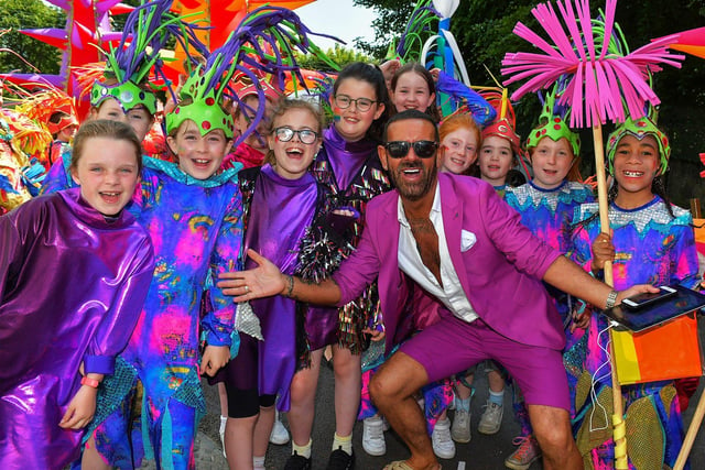 Grand Marshall, Derry’s own Micky Doherty, pictured participants at the Inishowen Pride Parade held in Buncrana on Sunday afternoon. Photo: George Sweeney. DER2322GS - 16