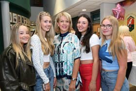 Mary Jo O'Carolan, left, Principal, pictured with Maggie Shiels, Summer Gillespie, Katie Nash and Ava Whoriskey when they collected their GCSE results at St. Cecilia's College on Thursday morning.
