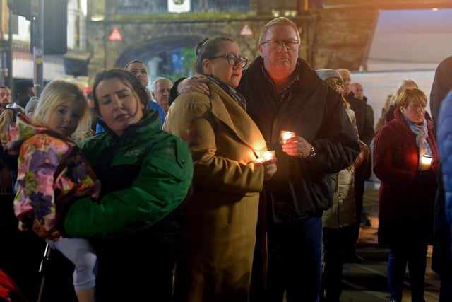 Some of the attendance at a candlelit vigil, held at Guildhall Square on Monday evening, to remember those who died in the Creeslough tragedy on Friday afternoon last.  Photo: George Sweeney.  DER2241GS – 52