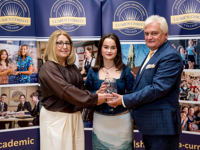 Mary-Tess Harron pictured with Mr Micheál Harron (Board of Governors) & Mrs Maeve McMenamin (Head of English) receiving the Paul Wilkins Award for Top Student in A2 English Literature. Lumen Christi College