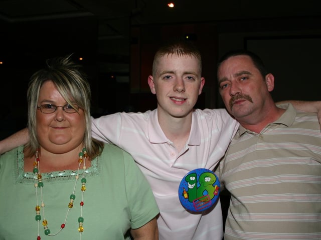Terry Doherty with mum Margaret and dad Frankie at PO  Club enjoying the party 8056dd : Parties and celebrations in August 2005.