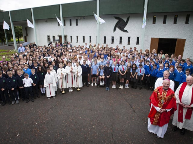 CONFIRMATION MASS OF THANKSGIVING. . . . .The Bishop of Derry Dr. Donal McKeown pictured with pupils from schools in the Three Patrons Parish who received the Sacrament of Confirmation this year, at a special Thanksgiving Mass at St. Brigid’s Church, Carnhill last week. Schools in attendance included St. Brigid’s PS, St. Paul’s PS, St. Therese PS, Greenhaw PS, St. Patrick’s PS, Pennyburn and Ardnashee School. Celebrating Mass with Bishop McKeown were Fr. McGaughey and Fr. O’Donnell. (Photos: Jim McCafferty Photography)