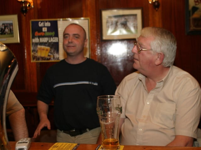 Regulars enjoying the company and the crack in the Alleyman's in July 2004.