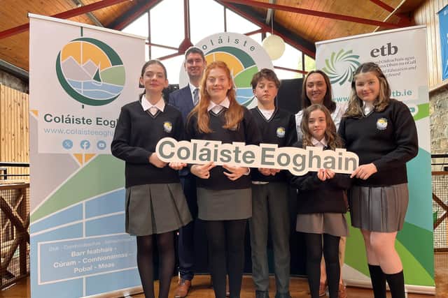 Coláiste Eoghain first years in their new uniforms with Principal and Deputy.