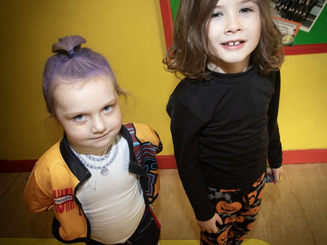 Hollybush PS pupils Luciana and Oisin pause on their way to the disco for a photo on Wednesday. : .