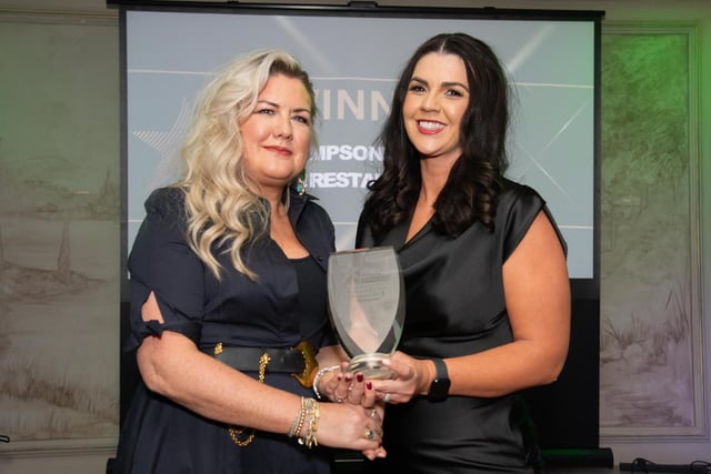 Sharon McDaid, Silver Birch Gallery & Studio presenting the Eatery of the Year Award to Maria Simpson, Simpsons Bar and Resturant at the Carndonagh Traders Association Business and Community Awards in Ballyliffen Lodge Hotel on Saturday night last. Photo Clive Wasson