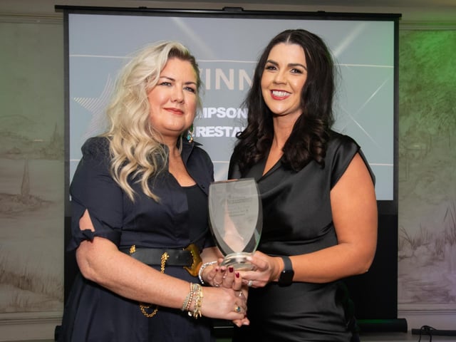 Sharon McDaid, Silver Birch Gallery & Studio presenting the Eatery of the Year Award to Maria Simpson, Simpsons Bar and Resturant at the Carndonagh Traders Association Business and Community Awards in Ballyliffen Lodge Hotel on Saturday night last.   Photo Clive Wasson