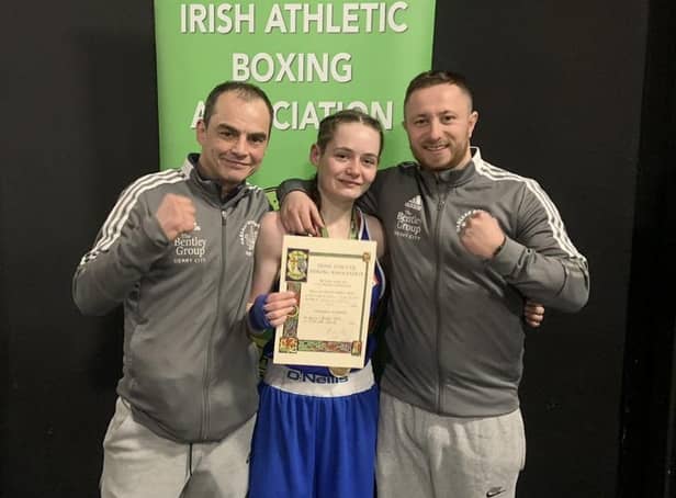 Oakleaf ABC's first ever female Irish champion Carleigh Irving, celebrates in Dublin with her coaches.