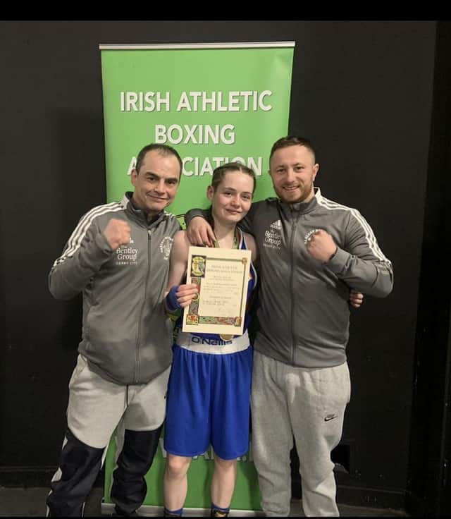 Oakleaf ABC's first ever female Irish champion Carleigh Irving, celebrates in Dublin with her coaches.