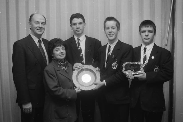 Mrs. Frances Robson, Board of Governors, presenting the Bishop Farren Memorial Prize for Best GCSE Results to joint winners Gary Devine and Conall Patton. Included are Mr. Patrick Kerr, vice-president and John Walker (Staff Prize for Commitment) at the St. Columb's College prize-giving.