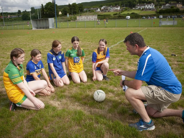 Burt coach Liam McKinney offers some advice before the start of the skills test.