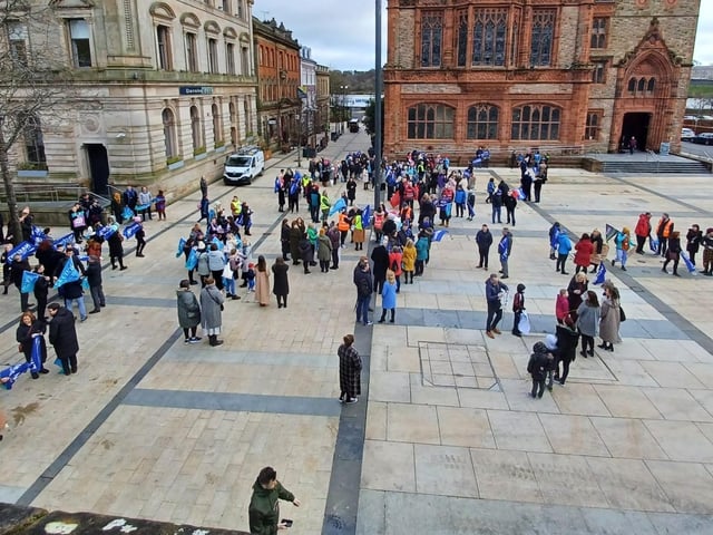 Trade unionists form up at Guildhall Square.