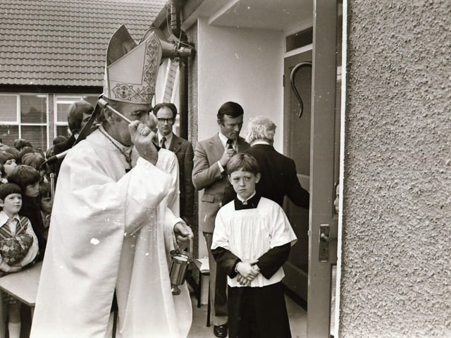 Reverend Dr Edward Daly, Bishop of Derry, blessing the school during its official opening in 1975.