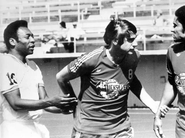 Hilary Carlyle separating Pelé and Eusébio.