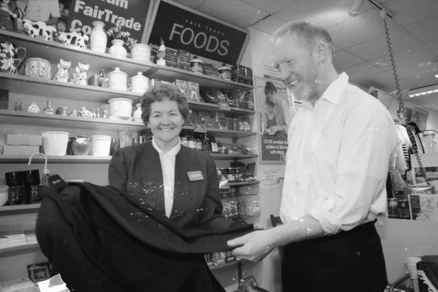 Dave Duggan picking up a Tuxedo from Mae Simpson, manageress of the Oxfam store in the Diamond, before heading to the Oscars where 'Dance Lexie Dance' was nominated for an Academy Award in the Best Live Action Short Film category.