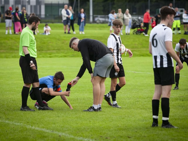 The Oxford captain gets some treatment for a head injury.