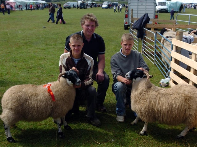 Billy, Seamus and Joseph Grant pictured with their pair of Ewe lambs , winners at Clonmany show. (0508A03) : Clonmany Festival, Vintage Show, Agricultural Show and Raft Race in August 2005.