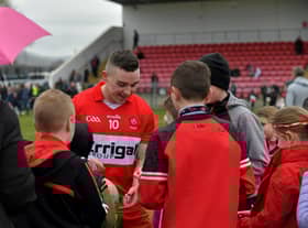 Niall Toner signs autographs after Derry’s victory over Clare at Owenbeg on Sunday afternoon. Photo: George Sweeney. DER2312GS - 16