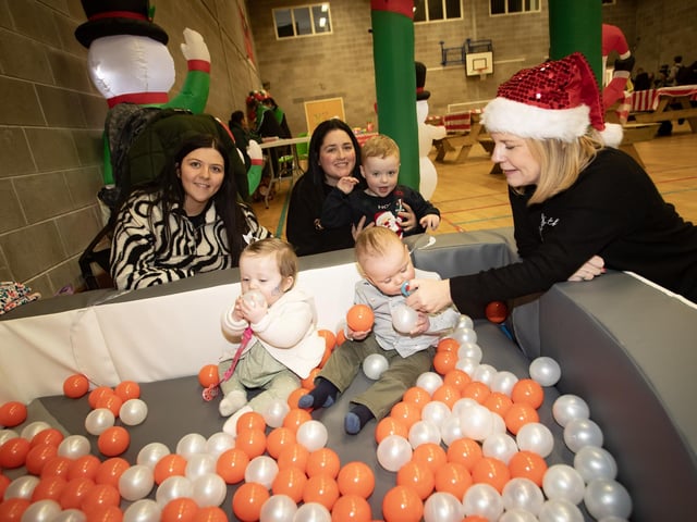 CHRISTMAS GET-TOGETHER. . . .Fun and games for these toddlers at the 'Christmas Get Together' at the Long Tower Youth Club on Saturday last. The event was organised by Feile Derry and funded by The Executive Office and T:buc Central Good Relations Fund. (Photos: Jim McCafferty Photography) : .