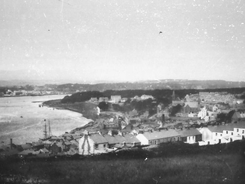 A view of the River Foyle, and part of the Waterside, as seen from the hill overlooking Craigavon Bridge, where Gobnascale stands today. Notice the jetties below Ebrington Barracks from where the ferry operated to the west bank. Photo take sometime between 1875 and 1893.