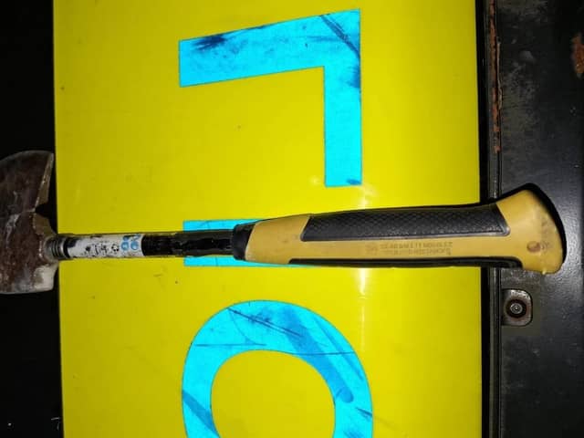 A hatchet thrown at police during rioting by racists in Ballymena.