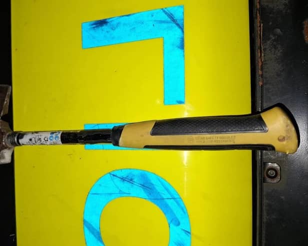 A hatchet thrown at police during rioting by racists in Ballymena.