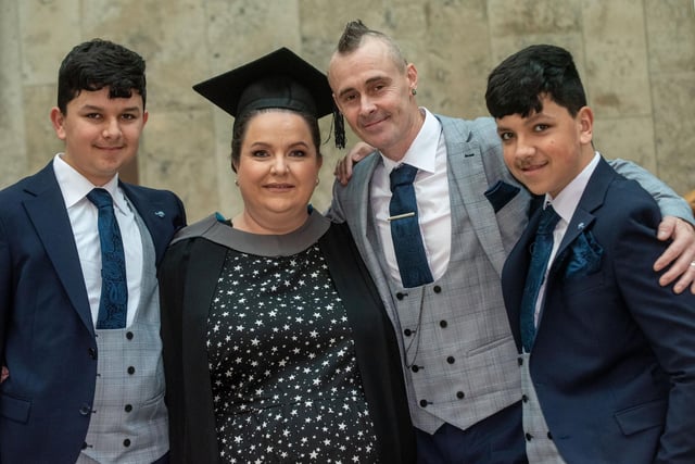 Ashling Donnelly from Buncrana who graduated in Early Years pictured at NWRC's Graduation Ceremony with husband Ronnie and sons Jamie and Aaron. 