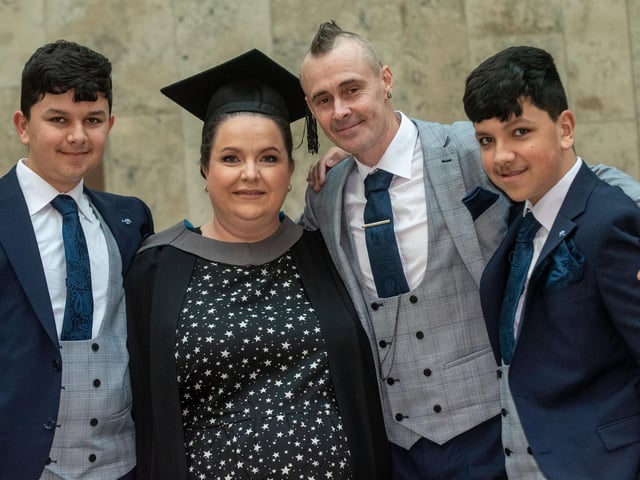 Ashling Donnelly from Buncrana who graduated in Early Years pictured at NWRC's Graduation Ceremony with husband Ronnie and sons Jamie and Aaron.