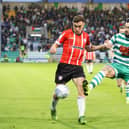 Derry City's Joe Thomson tussles with Shamrock Rovers midfielder Richie Towell during their encounter at Tallaght Stadium, in May.