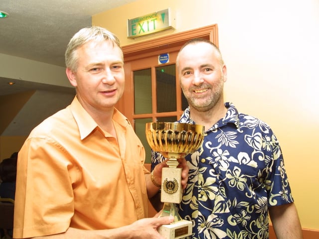 Gerry Kelly (Chief Executive) presenting the trophy to Shane Brunker (Strand Foyer)