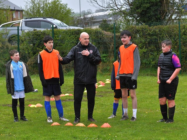 Gerry Shepherd, Derry City FC, coaching at the Easter Soccer Camp held at Broadbridge Primary School. Picture: George Sweeney. DER2315GS – 138