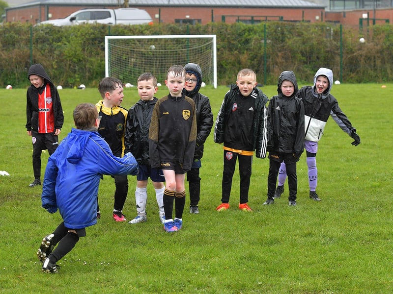 The inclement weather, on Tuesday, didn't stop the children enjoying the fun and games at the Derry City Easter Soccer Camp at Broadbridge Primary School. Picture: George Sweeney. DER2315GS – 136