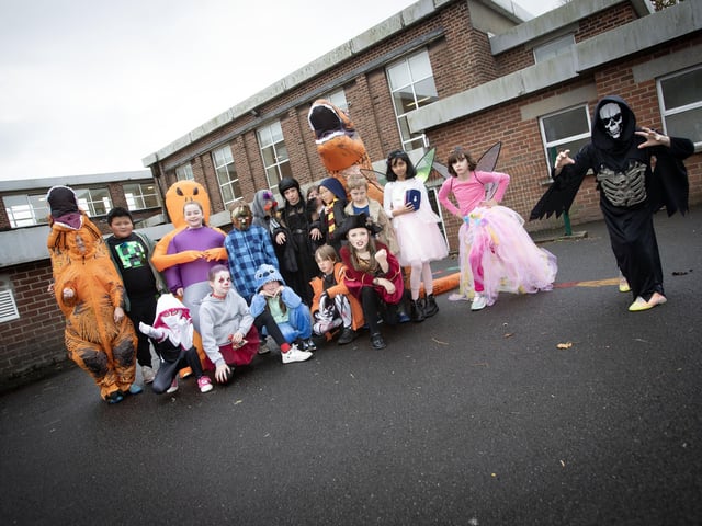 Enter this school if you dare. . . . .Some of the children from Model Primary School mark Halloween on Thursday last.