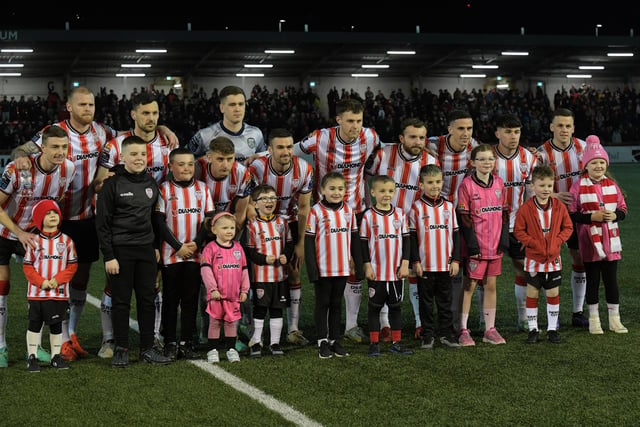 Mascots pictured with the Derry City starting eleven against Waterford. Photograph: George Sweeney