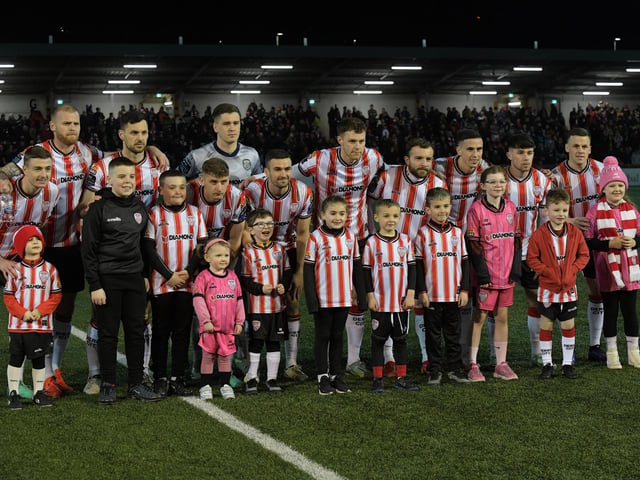 Mascots pictured with the Derry City starting eleven against Waterford. Photograph: George Sweeney