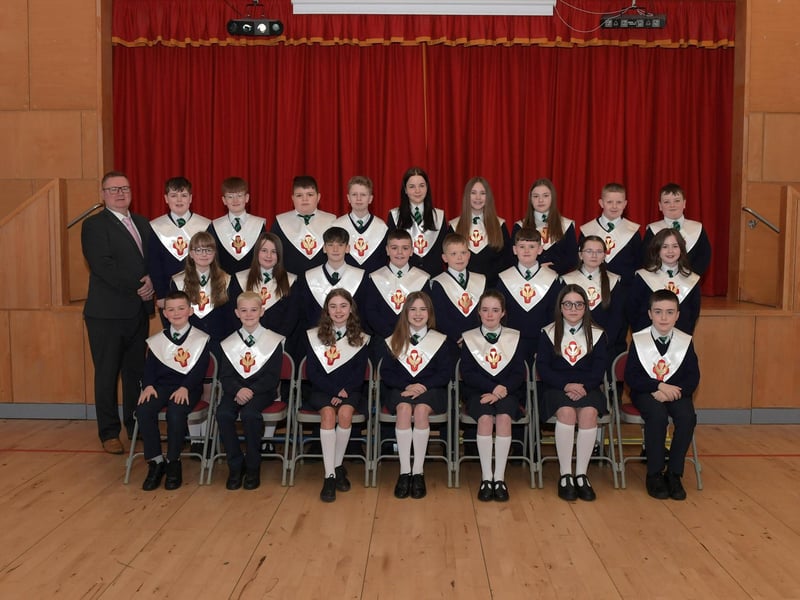 Pupils from St Patrick’s Primary School who recently made their Confirmation at St Patrick’s Church in Pennyburn. Included in the photograph is Mr. J. Bradley (teacher).  Photo: George Sweeney