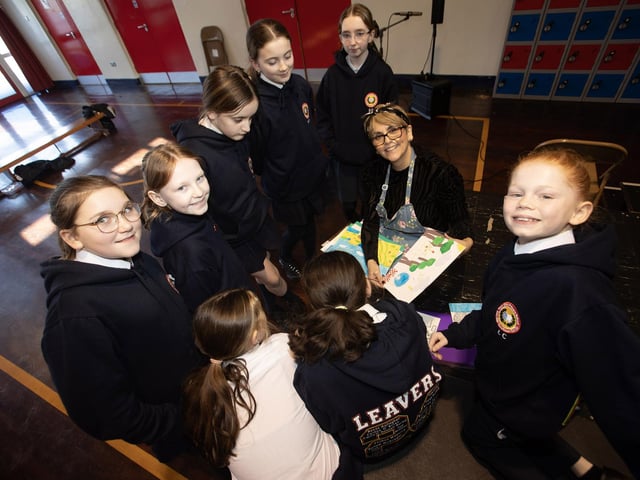 Sinead Devine, DEEDS and Older Adult Co-Ordinator, OLT pictured with some of the pupils from Holy Child PS on Wednesday last.